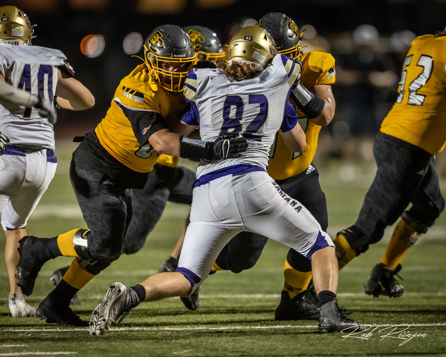 El Cap lineman blocking the defenders